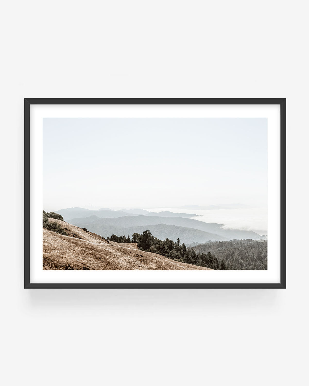 Mount Tamalpais landscape photography in black frame showing rolling hills, forest, and soft fog, nature wall art print.