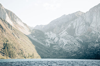 Convict Lake landscape photography featuring blue water surrounded by dramatic Sierra Nevada mountains in California.