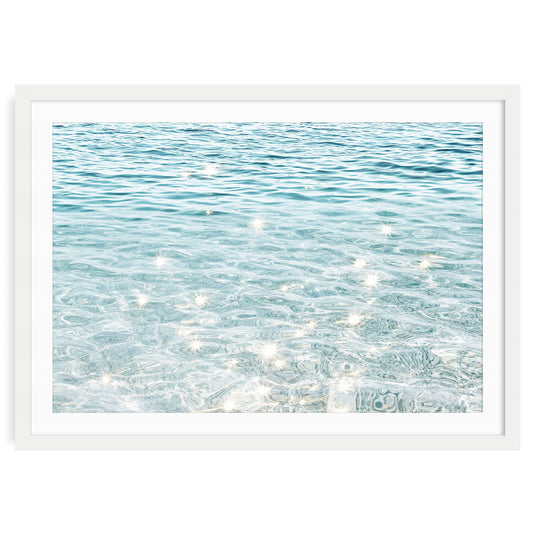 Sparkling ocean water fine art print featuring sunlight reflections on gentle blue waves, perfect coastal wall art for beach-inspired home décor
