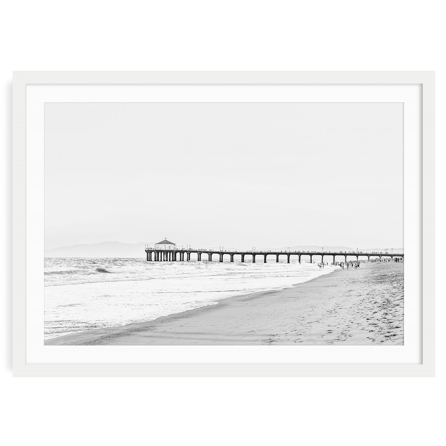Black and white fine art photograph of Manhattan Beach Pier with ocean waves and horizon, coastal photography wall art print for modern home or office decor