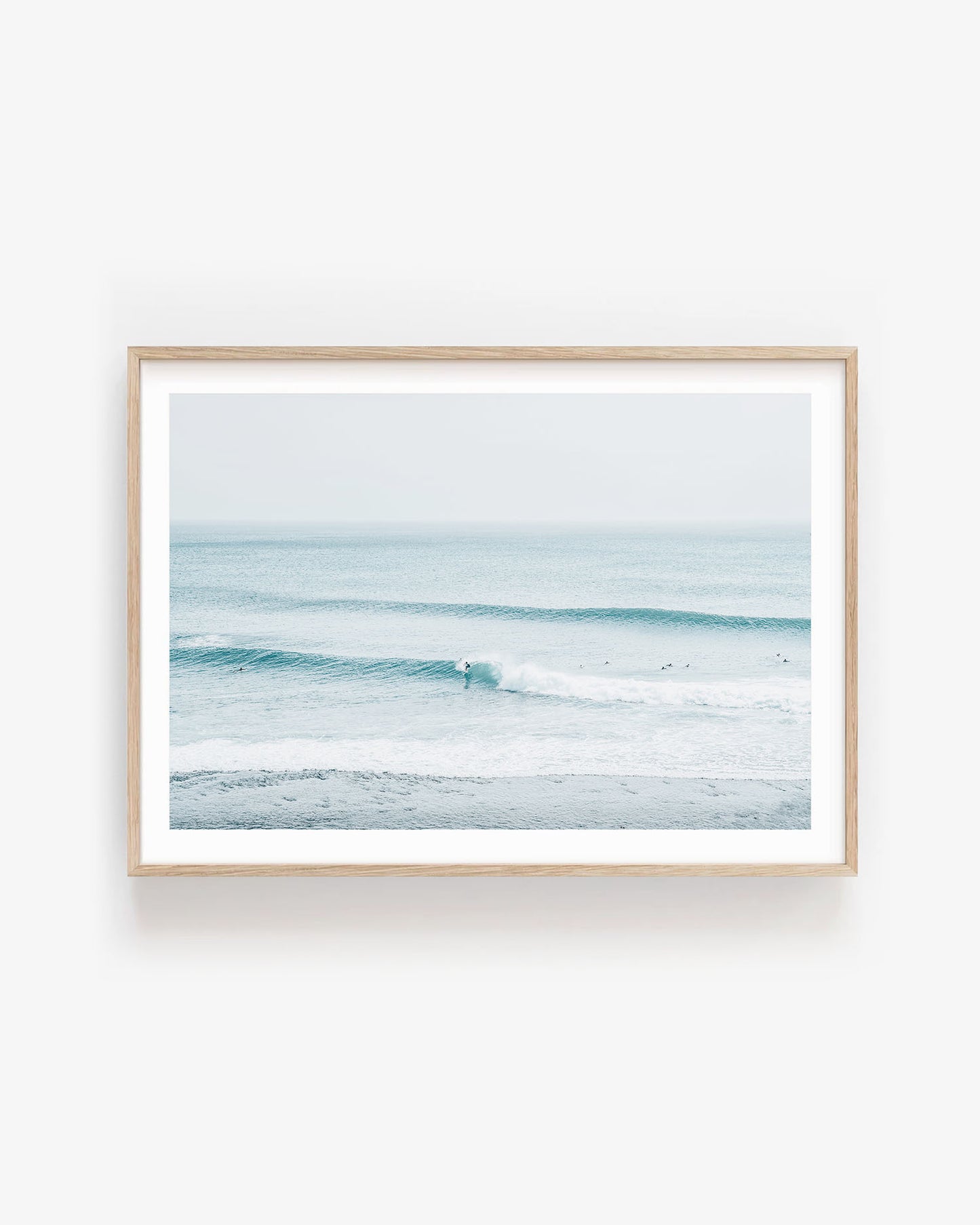 Fine art photo of soft blue ocean waves gently rolling to shore, capturing a peaceful coastal atmosphere; ideal wall art for relaxed, coastal grandmother decor.