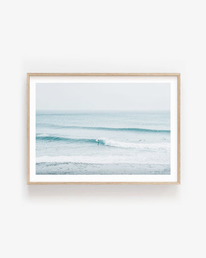 Fine art photo of soft blue ocean waves gently rolling to shore, capturing a peaceful coastal atmosphere; ideal wall art for relaxed, coastal grandmother decor.