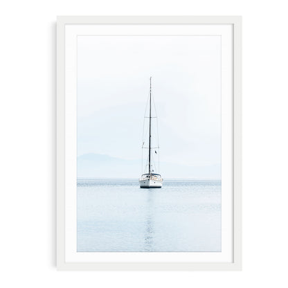 Minimalist sailboat fine art print featuring a single white sailing yacht on calm ocean water under an open sky, ideal for nautical coastal wall decor.