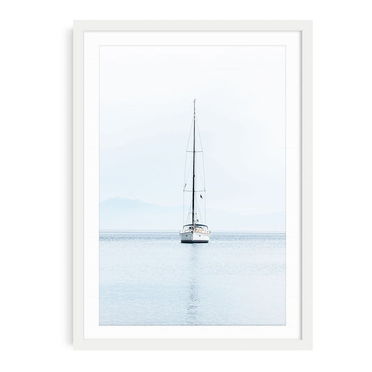 Minimalist sailboat fine art print featuring a single white sailing yacht on calm ocean water under an open sky, ideal for nautical coastal wall decor.