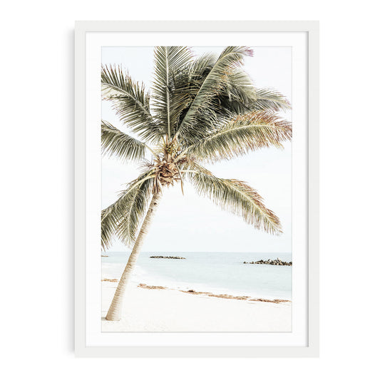 Tropical island palm tree wall art print with soft minimalist beach tones, perfect for resort-style and coastal home decor.