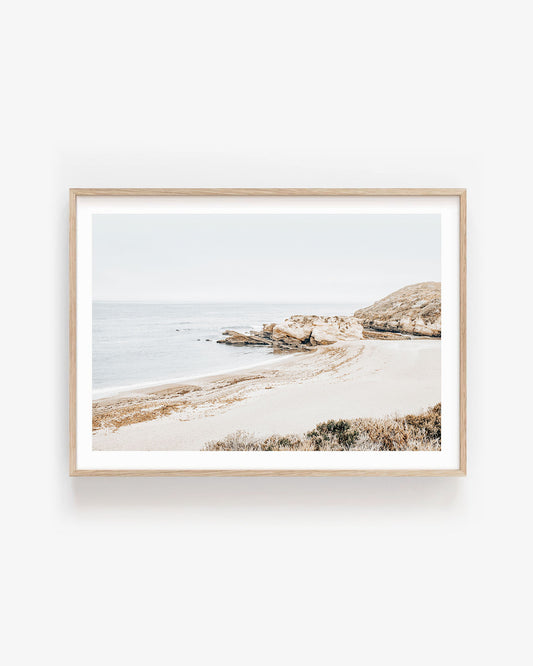 Minimalist Montaña de Oro beach print featuring soft ocean waves and coastal cliffs, neutral tones for modern minimalist wall decor