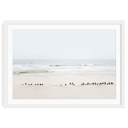 Neutral beach wall art featuring a minimalist ocean scene in soft tones, horizontal framed seascape print for calming coastal home decor.