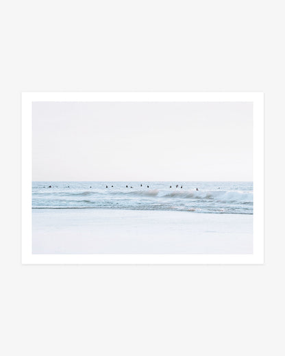 an Clemente surfer wall art featuring a scattered lineup waiting beyond a breaking Pacific wave beneath a pale coastal sky.