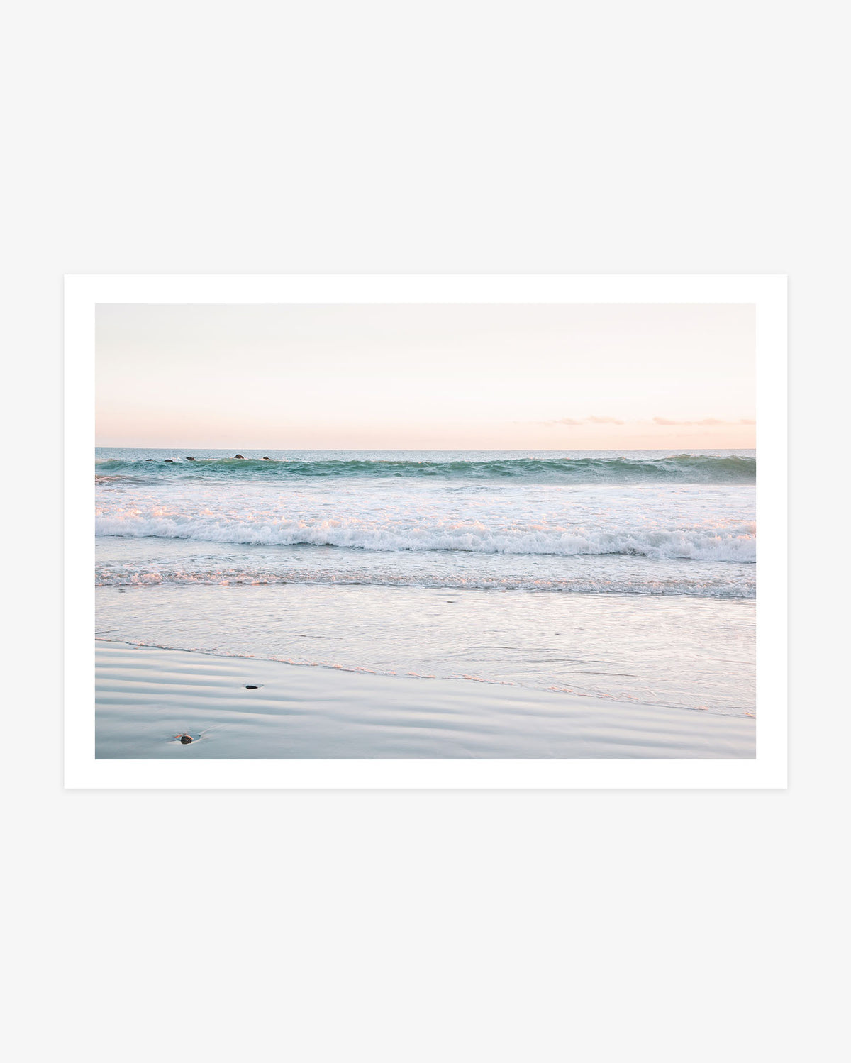 Dana Point beach wall art featuring gentle Pacific waves, reflective wet sand and a soft blue and blush morning sky.