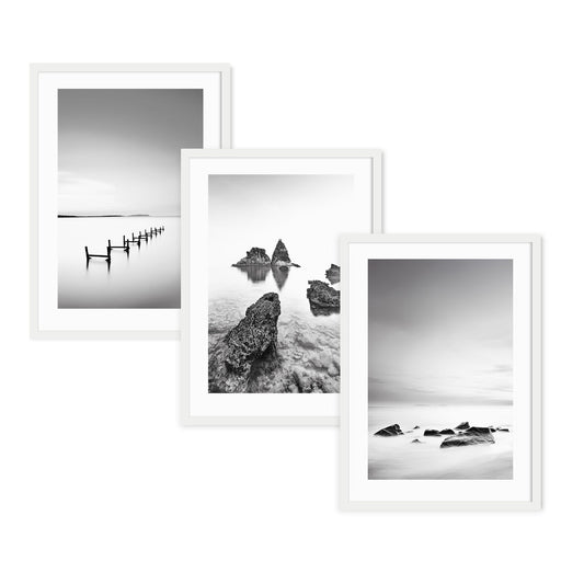 Fine art black and white beach wall art print in a white frame with mat