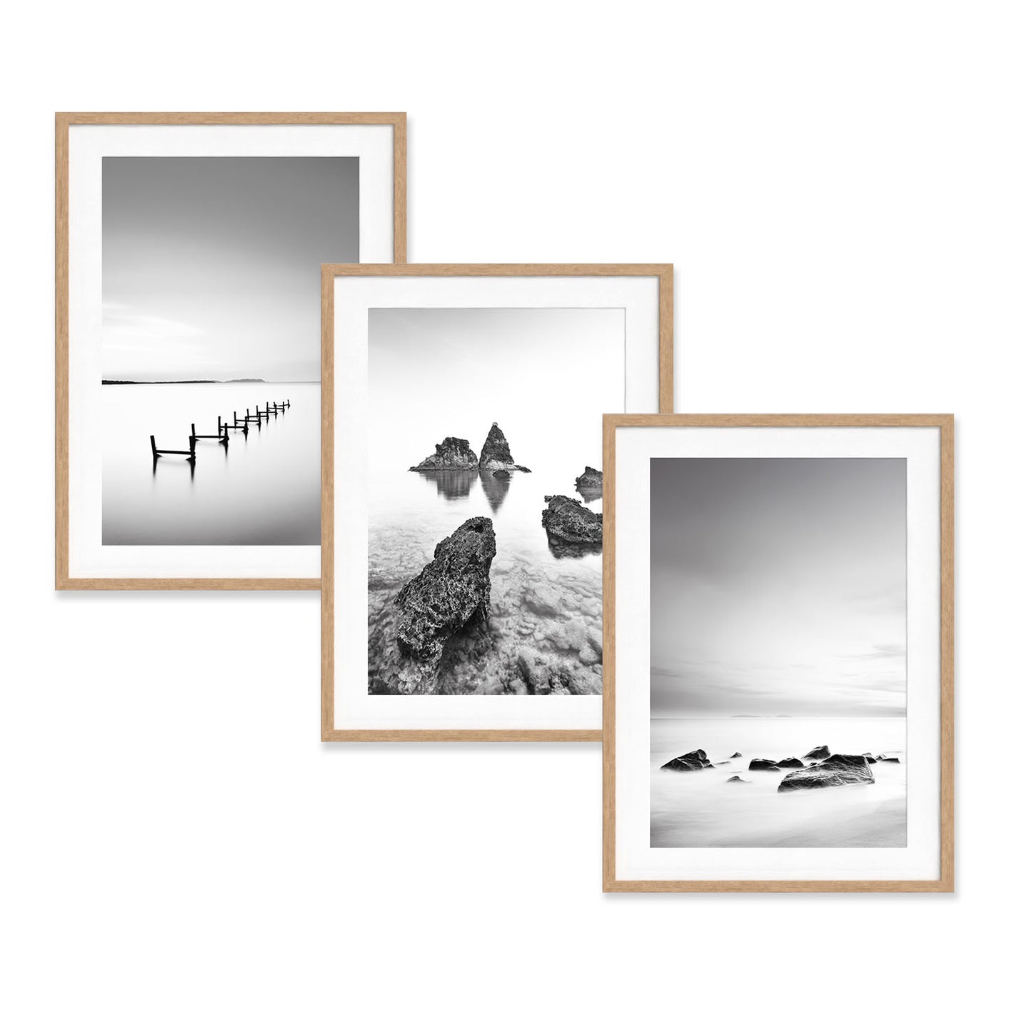 Minimalist black and white coastal photography print in a natural wood frame