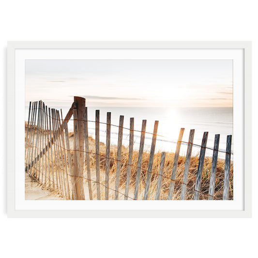 fine art print in white frame and mat of sunset beach fence wall art