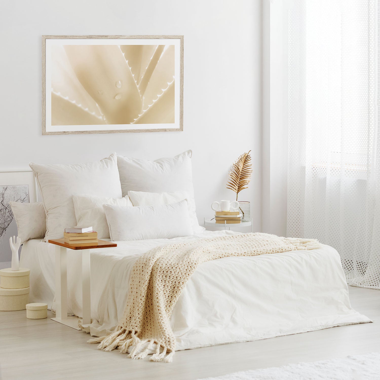 Aloe fine art print in beige tones displayed on the wall in a modern bedroom.