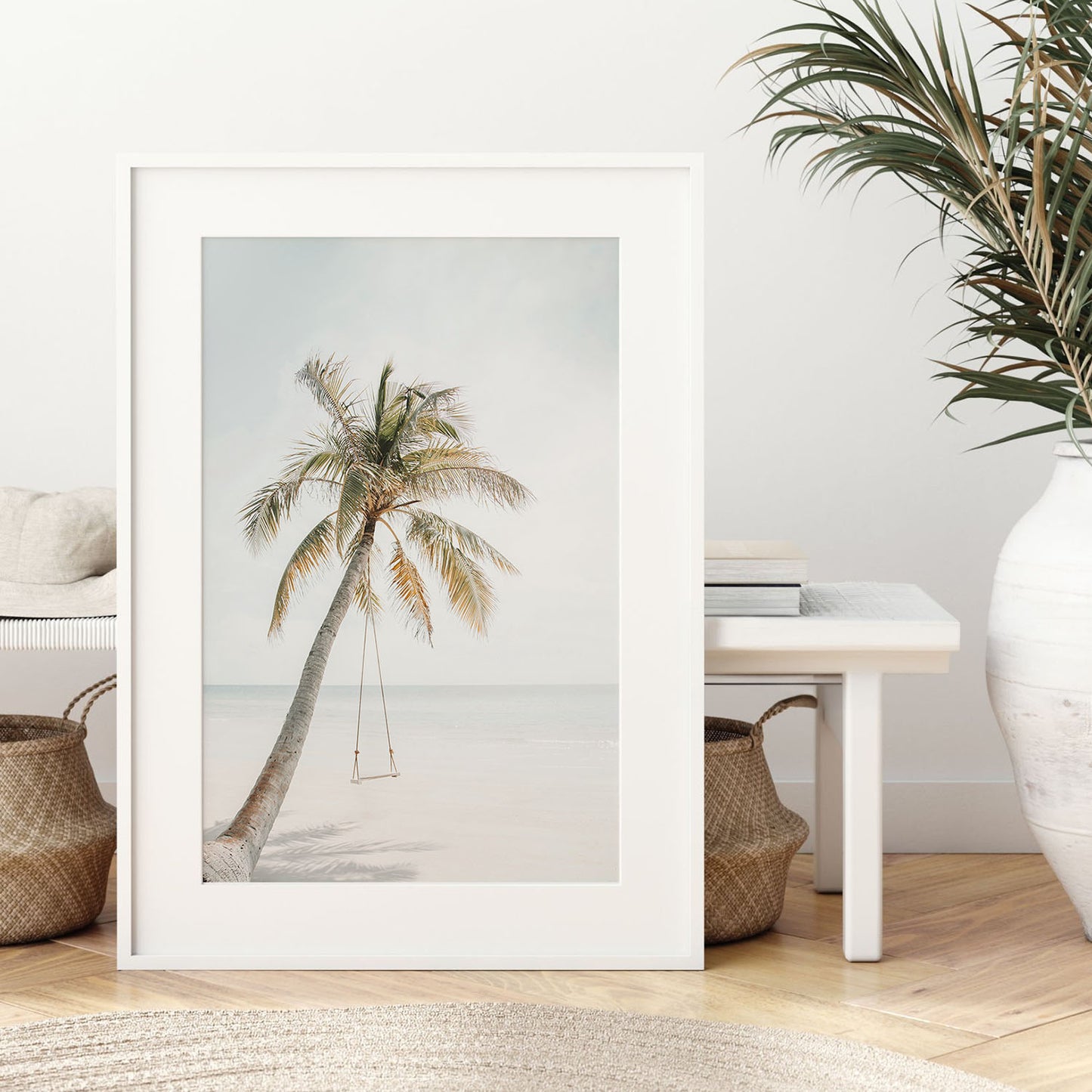 Palm tree swing coastal wall art print displayed in a modern fine art frame.