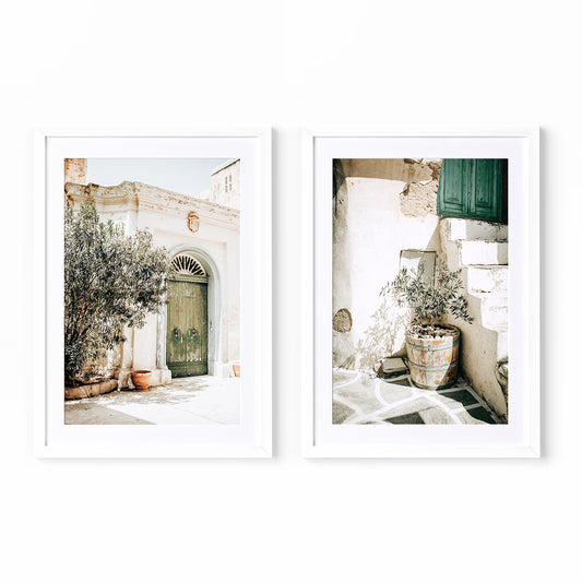Rustic architecture wall art set in a white frame and mat showing olive green door and Mediterranean plaster textures