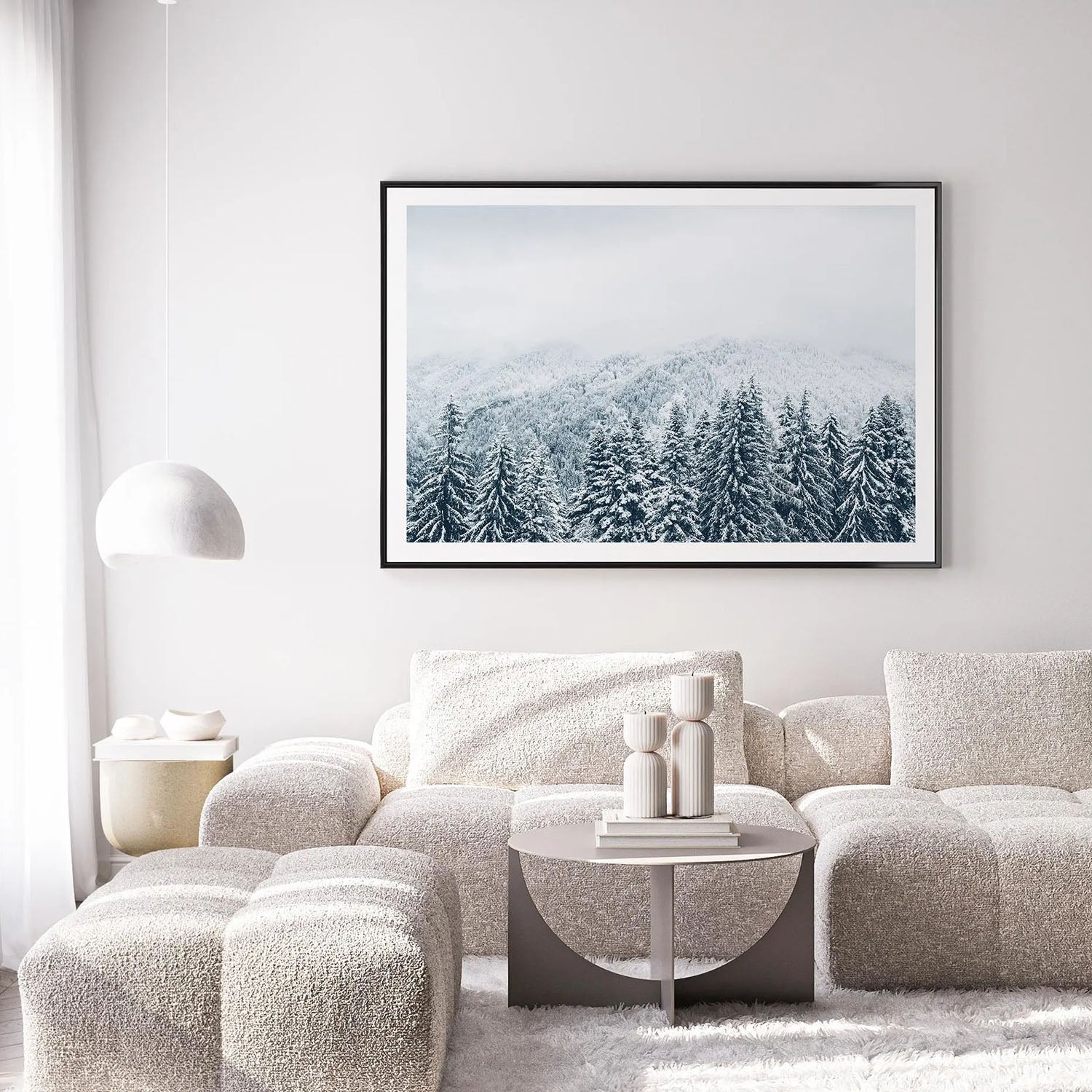 Snow covered evergreen forest wall art displayed in modern living room interior